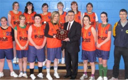 Pictured after their recent win are Carndonagh Community School senior girls basketball team. At front, from left, Karen Cooke, Eibhlin O' Kane, Kate Roddy, Danielle Doherty, Paul Fiorentini, principal, Caroline Kelly, Danielle Gordon and coach Finbarr Gallagher. Back row from left are Caitlin Moyne, Darine Stevens, Angeline O'Kane, Deirdre O'Donnell, Deirdre Foley and Laura D'Urso.